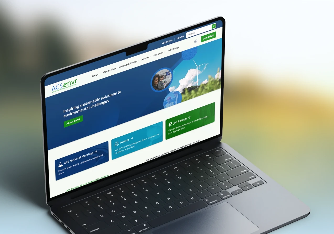 Laptop mockup of the ACS Division of Environmental Chemistry Website homepage.